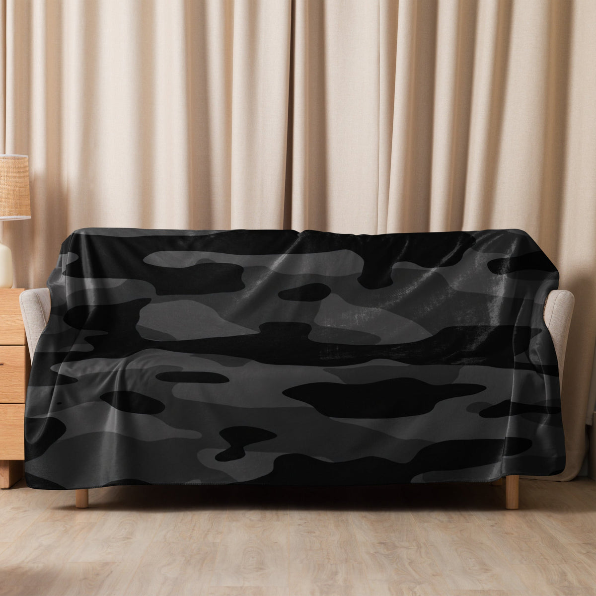 Black camo blanket black and gray camouflage plush blanket draped over a sofa for cozy home use