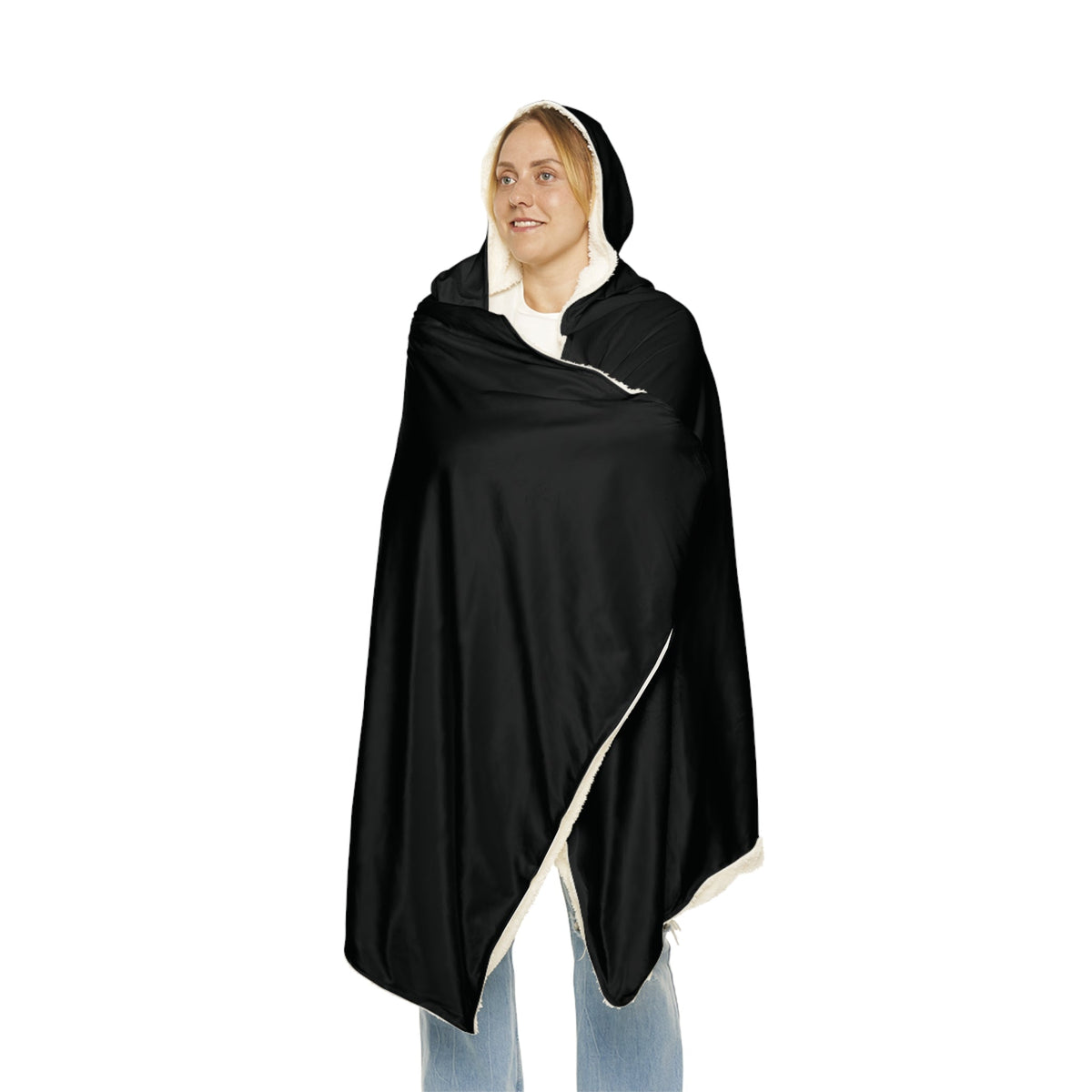 Black hooded blanket with white fleece lining and satin-like black outer fabric for warmth and comfort