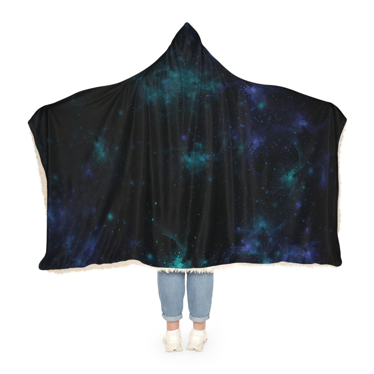 A cozy black galaxy hooded blanket with teal and blue cosmic design edged in soft white faux fur