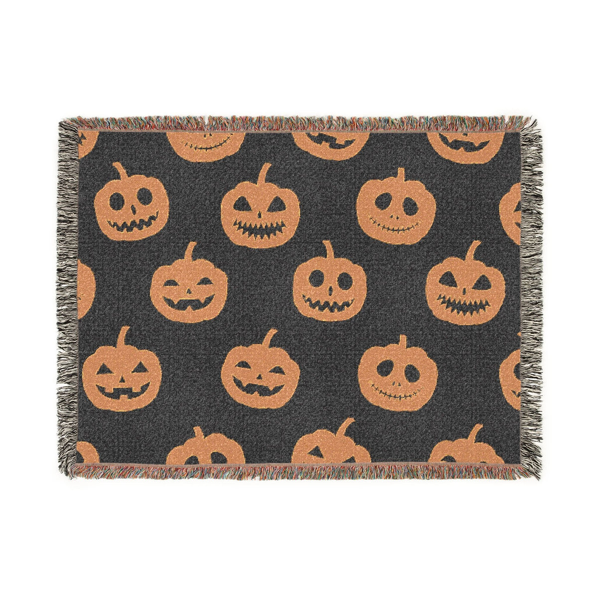 Halloween woven blanket black woven throw with orange jack o lantern faces and fringed edges for cozy decor