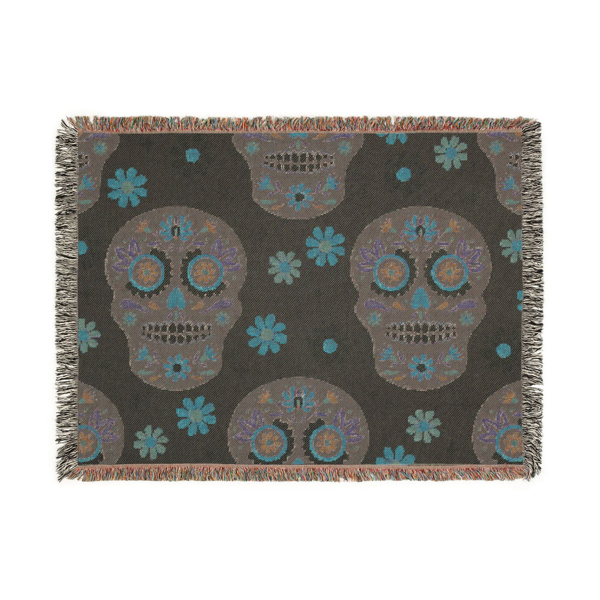 Dark gray Mexican woven blanket with colorful sugar skull pattern turquoise and purple accents and fringed edges