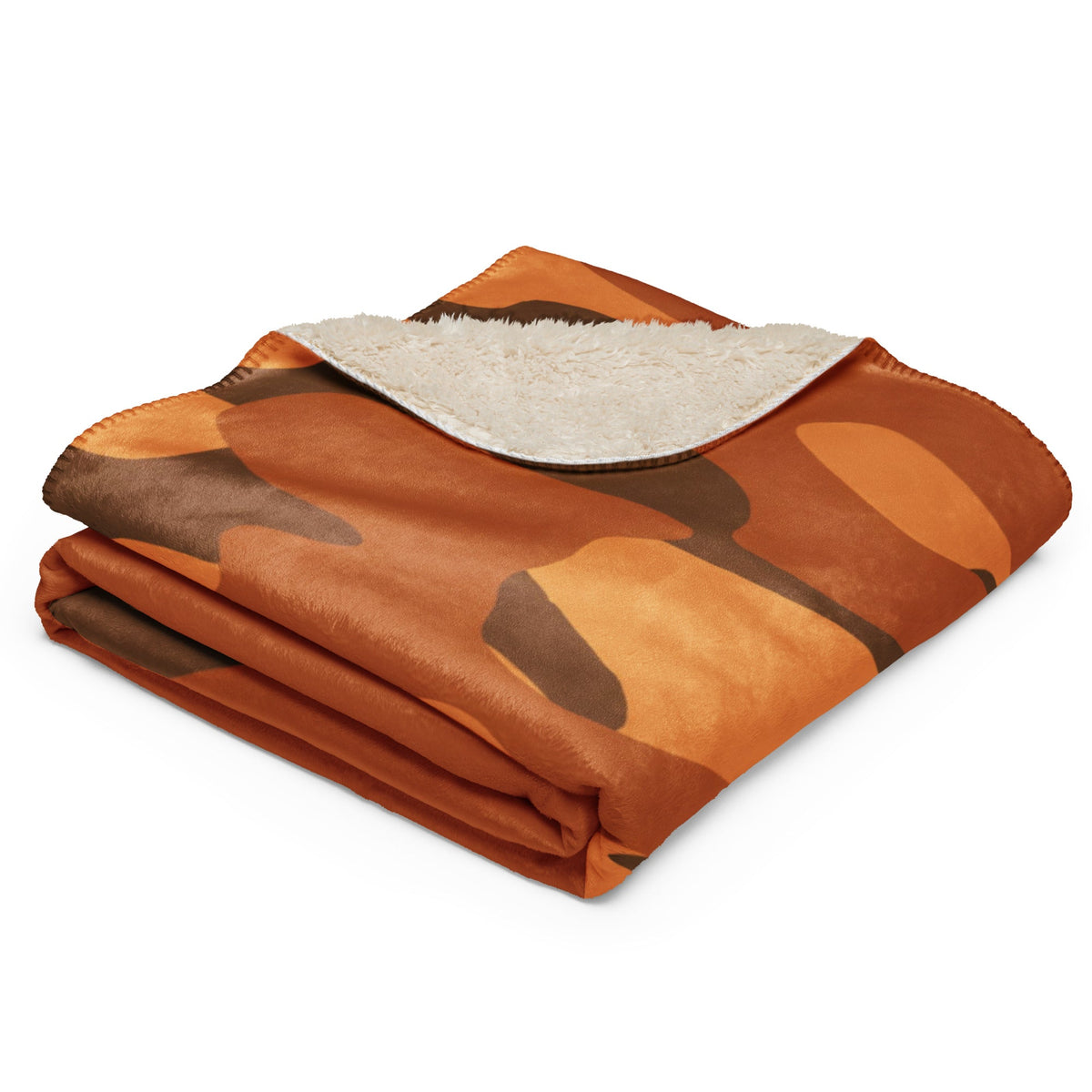 Orange camo blanket with cozy orange and brown camouflage pattern and plush white sherpa lining for warmth