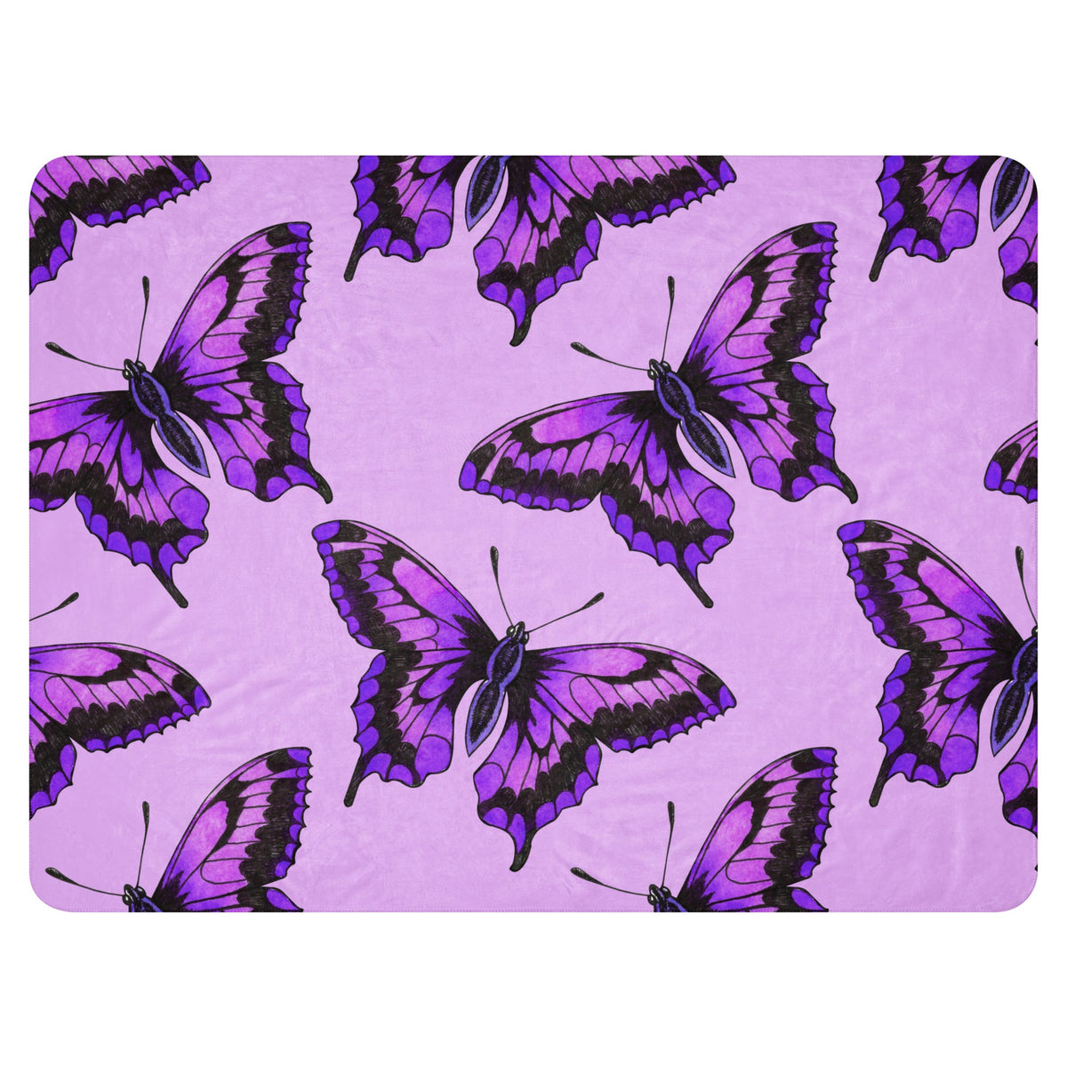 Purple fleece blanket with butterfly pattern showcasing soft material and vibrant design for cozy use