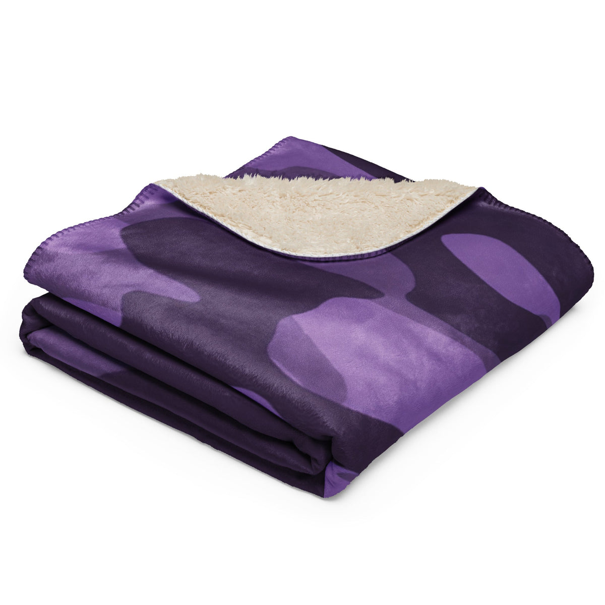 Purple camo throw blanket with plush cream colored sherpa lining for cozy warmth and stylish comfort