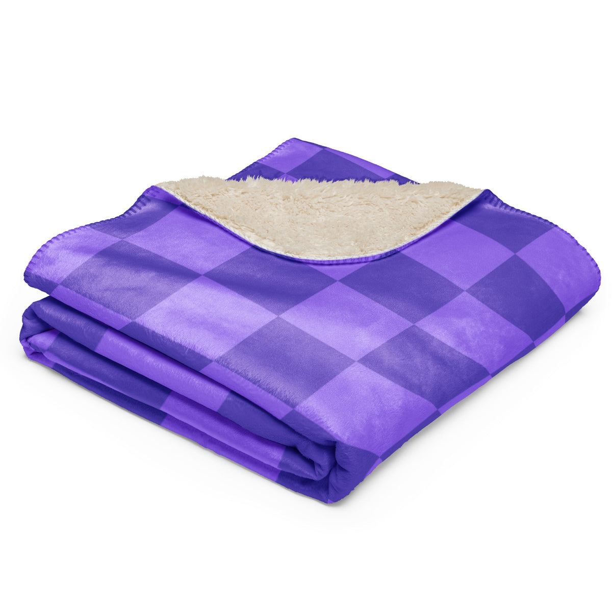 Purple checkered blanket with plush cream fleece interior and purple and navy blue checkered exterior