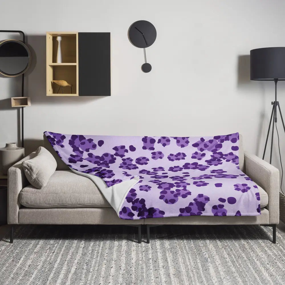 Purple leopard print blanket with purple floral pattern soft plush texture and white inner lining for cozy warmth