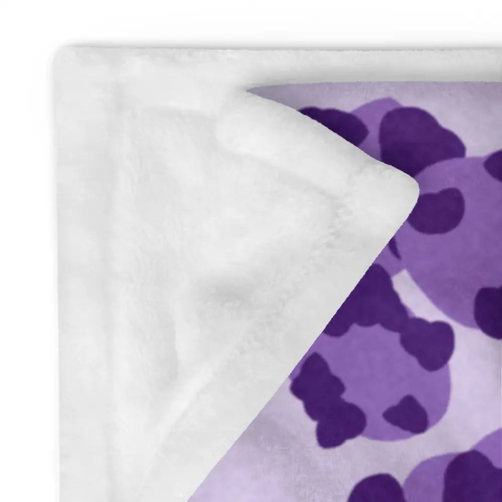 Purple leopard print blanket with soft white and purple plush fuzzy texture for cozy warmth and comfort
