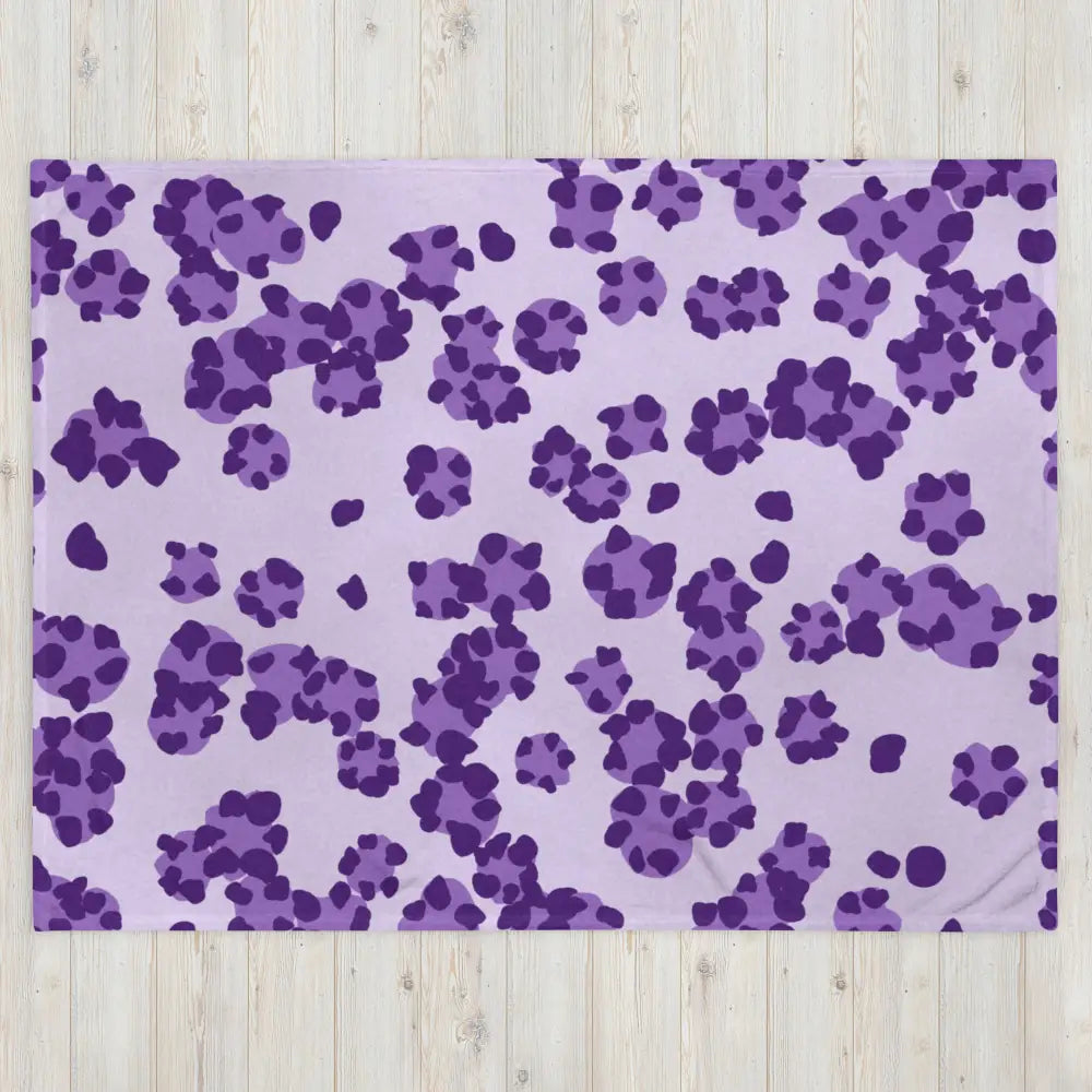 Purple leopard print fleece blanket featuring soft plush material perfect for cozy warmth and stylish decor