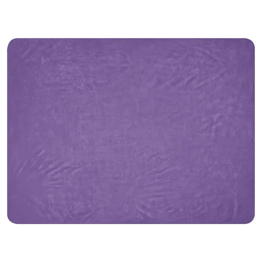 Purple sherpa throw blanket featuring a textured rectangular purple mat with soft cozy material