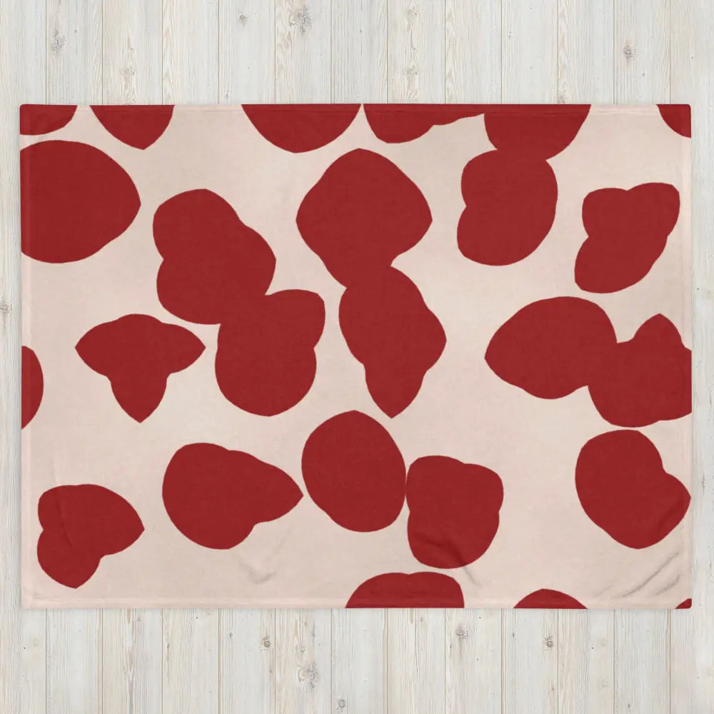Couverture rouge et crème en tissu doux blush avec motifs abstraits rouges irréguliers pour usage décoratif