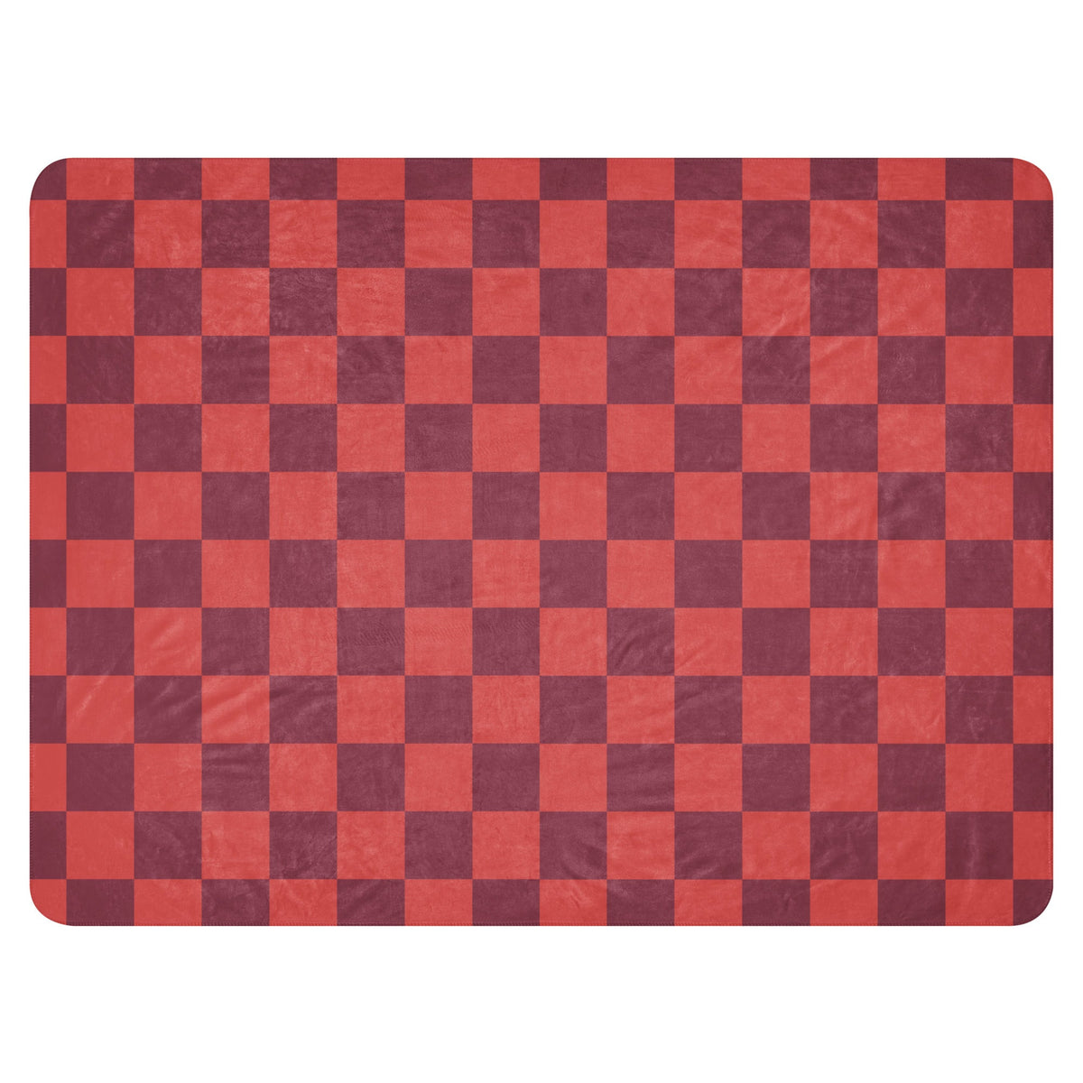 Red checkered clanket with a red and maroon checkered pattern and a slightly textured fabric surface