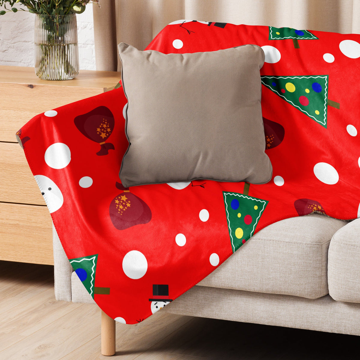 Red snowman Christmas blanket with festive snowmen trees and white polka dots perfect for holiday decor