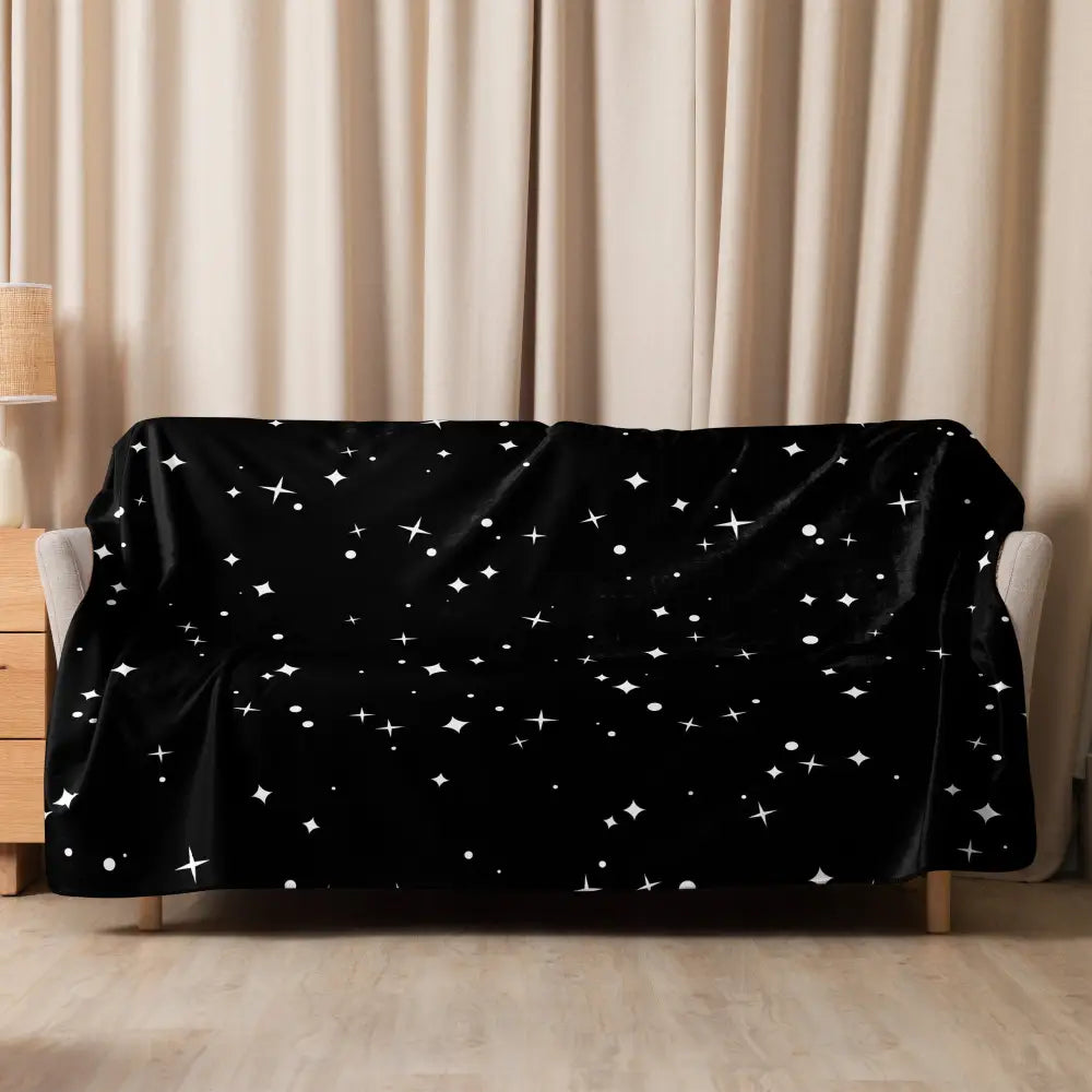 Black velvet sofa cover with a sparkling white star pattern from the star sherpa blanket collection