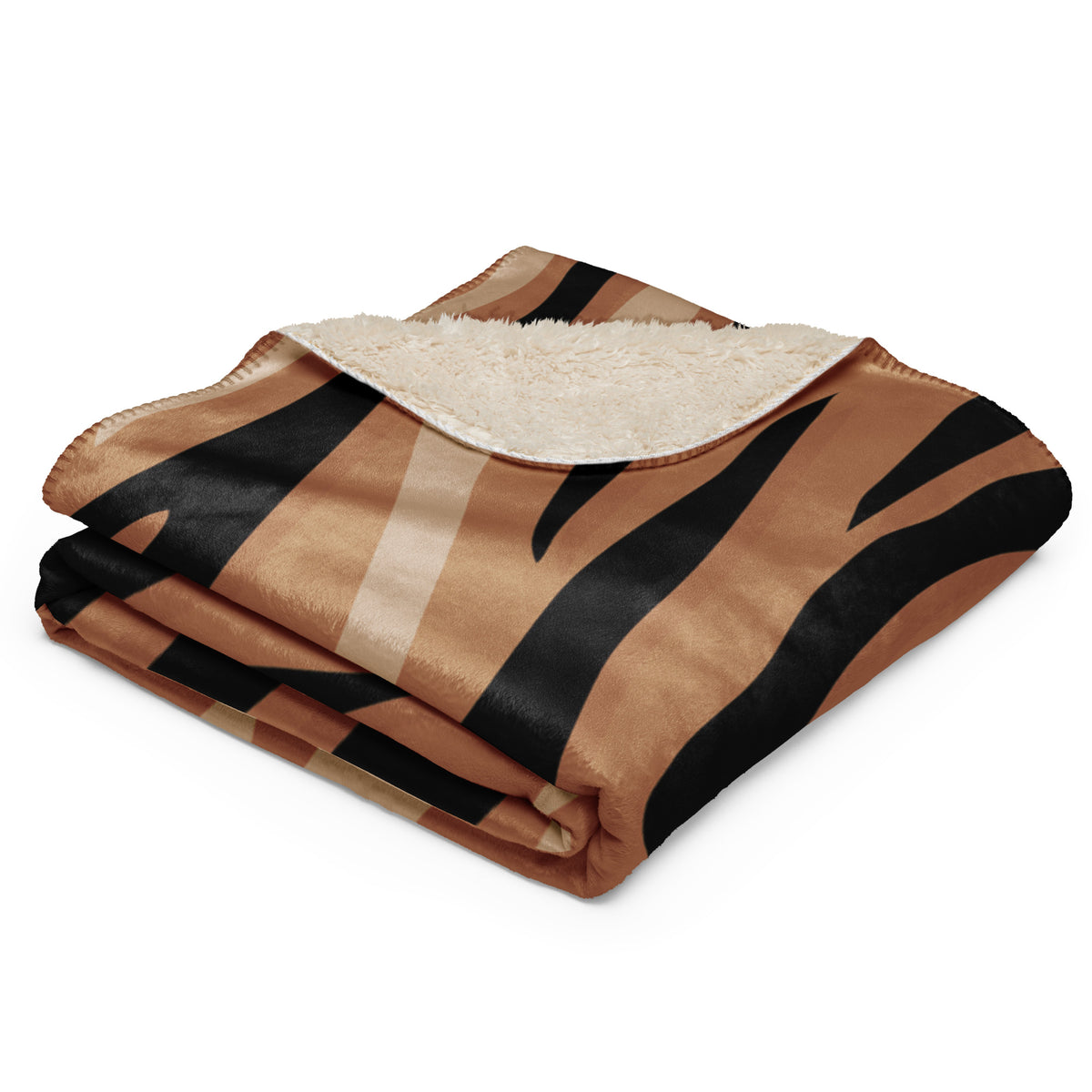 Brown tiger blanket with bold black and tan tiger stripe pattern and plush cream sherpa lining folded cozy fabric
