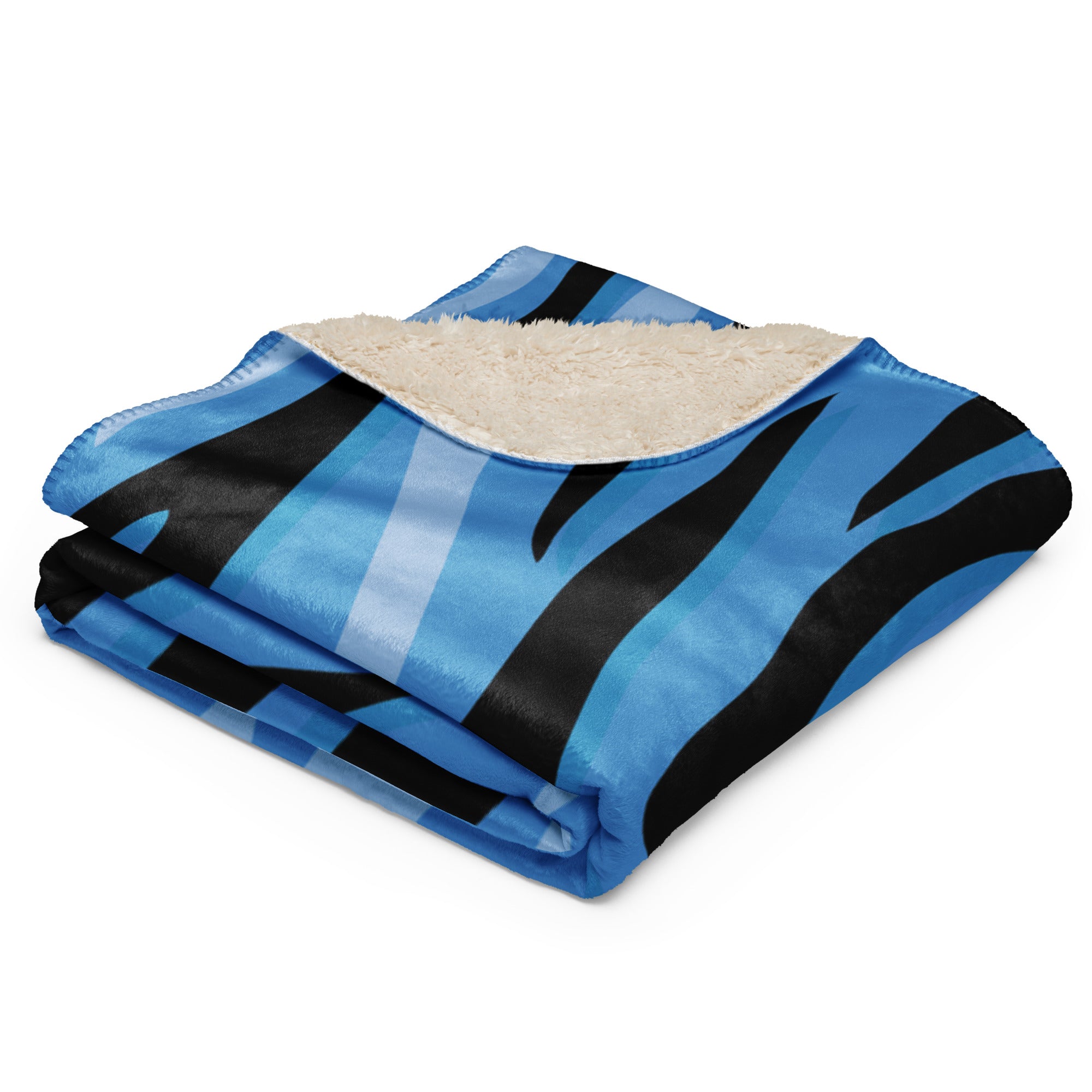 Blue tiger blanket with cozy blue and black zebra-striped fleece and plush cream-colored sherpa lining