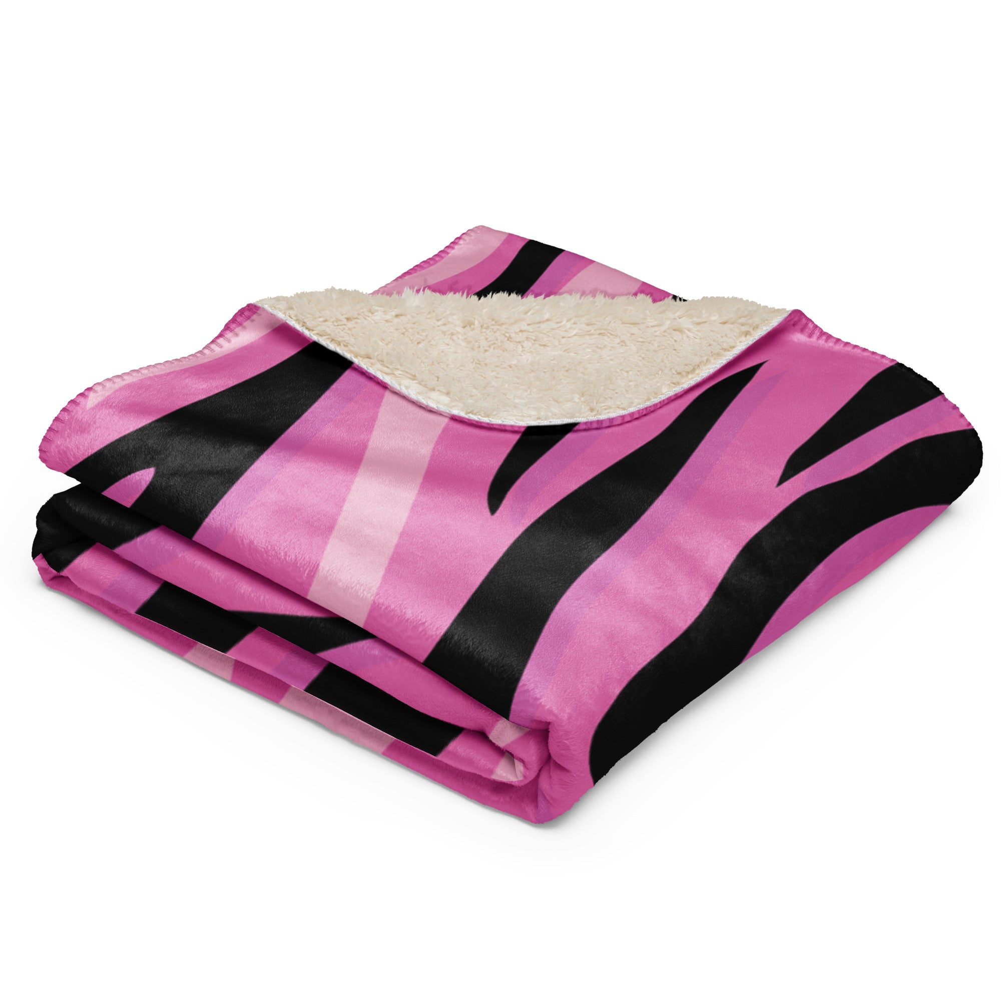 A cozy pink tiger blanket with black zebra stripes and plush cream sherpa lining for warmth and comfort
