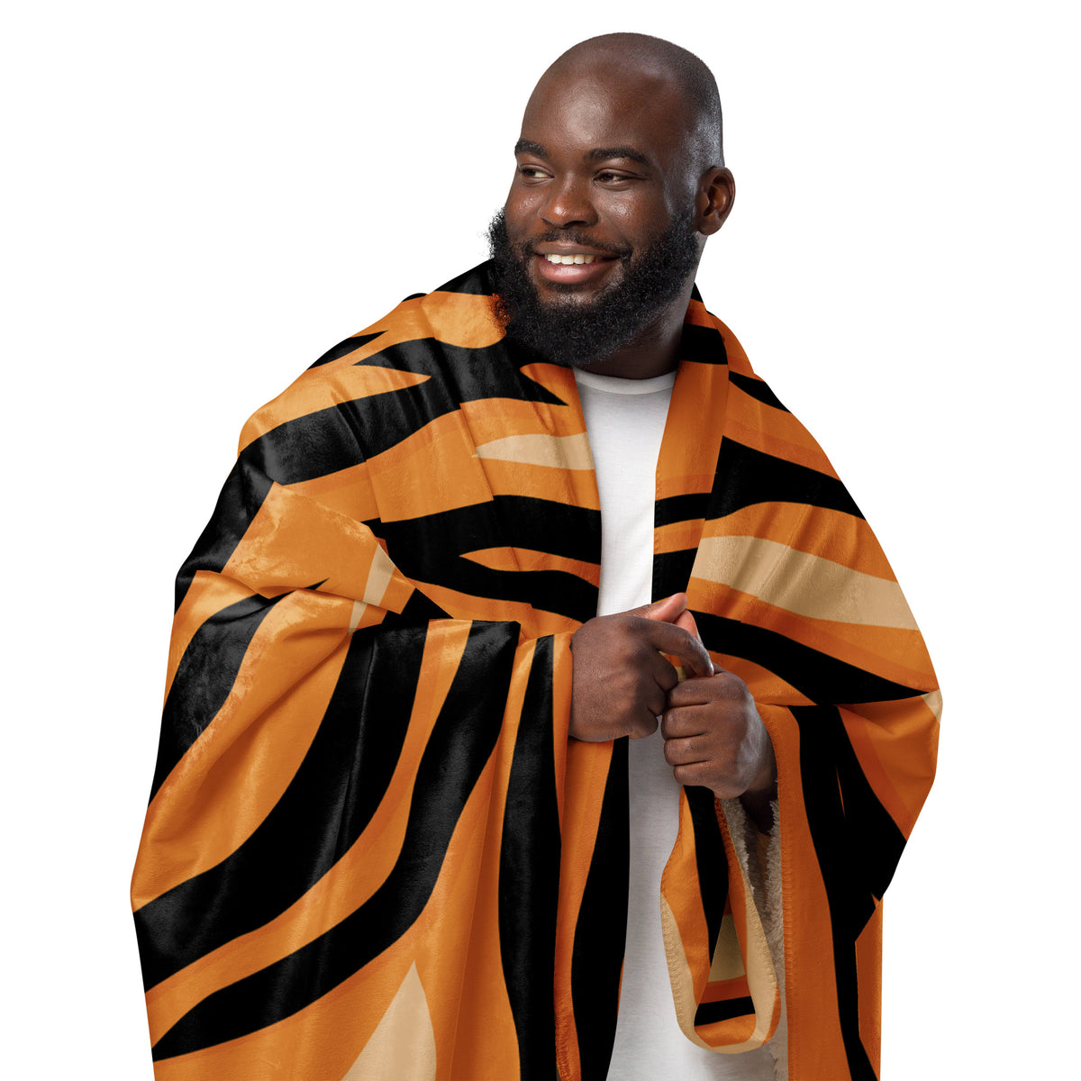 Orange tiger blanket with orange and black tiger stripes and a soft plush texture for cozy warmth
