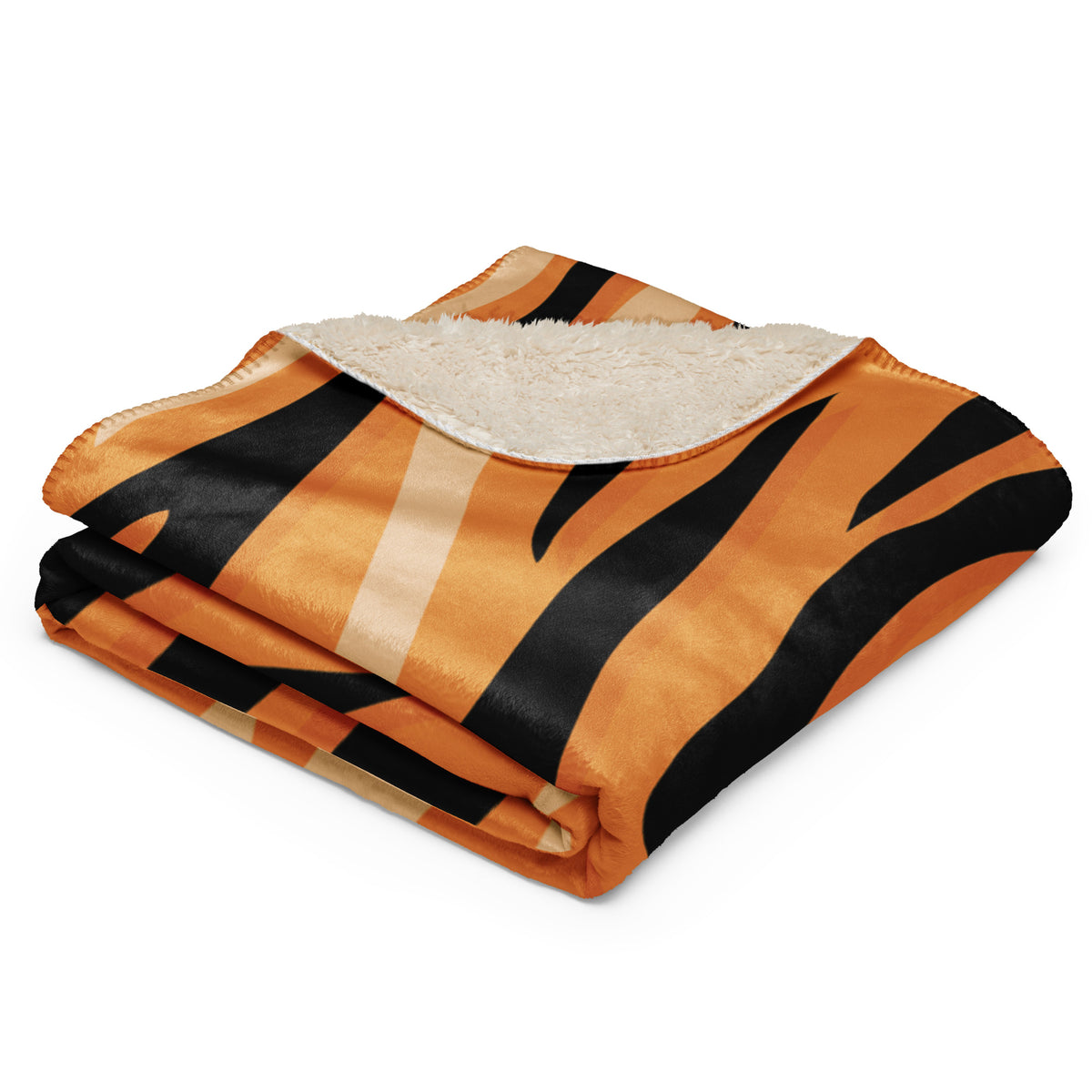 Orange tiger blanket fleece with black stripes and plush white sherpa lining for warm cozy use