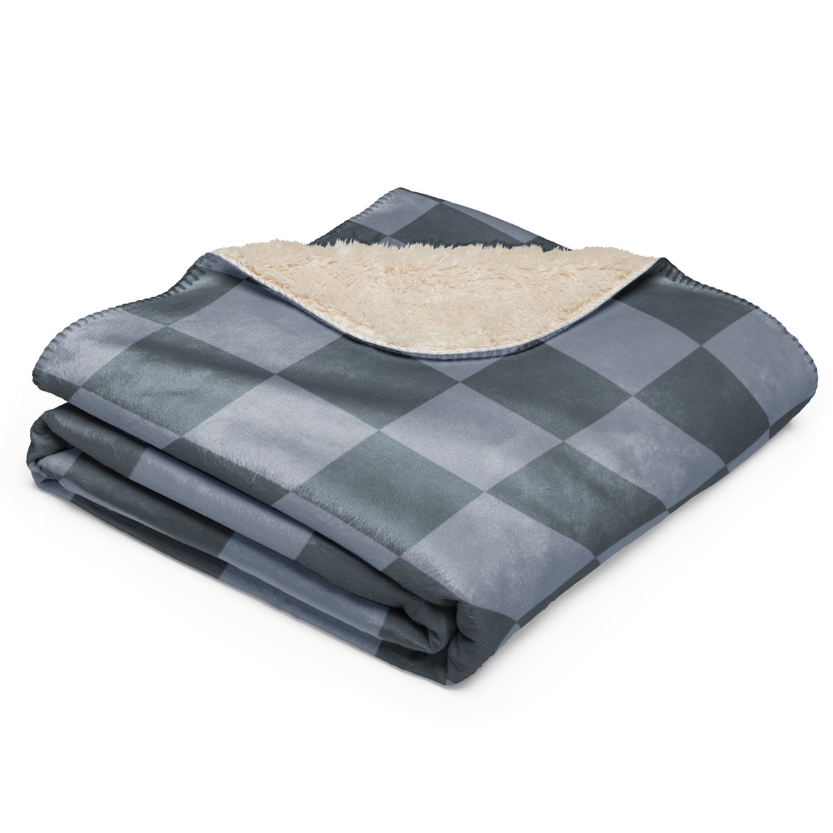 Grey checkered blanket with a gray and black checkered exterior and a plush beige fleece interior for warmth