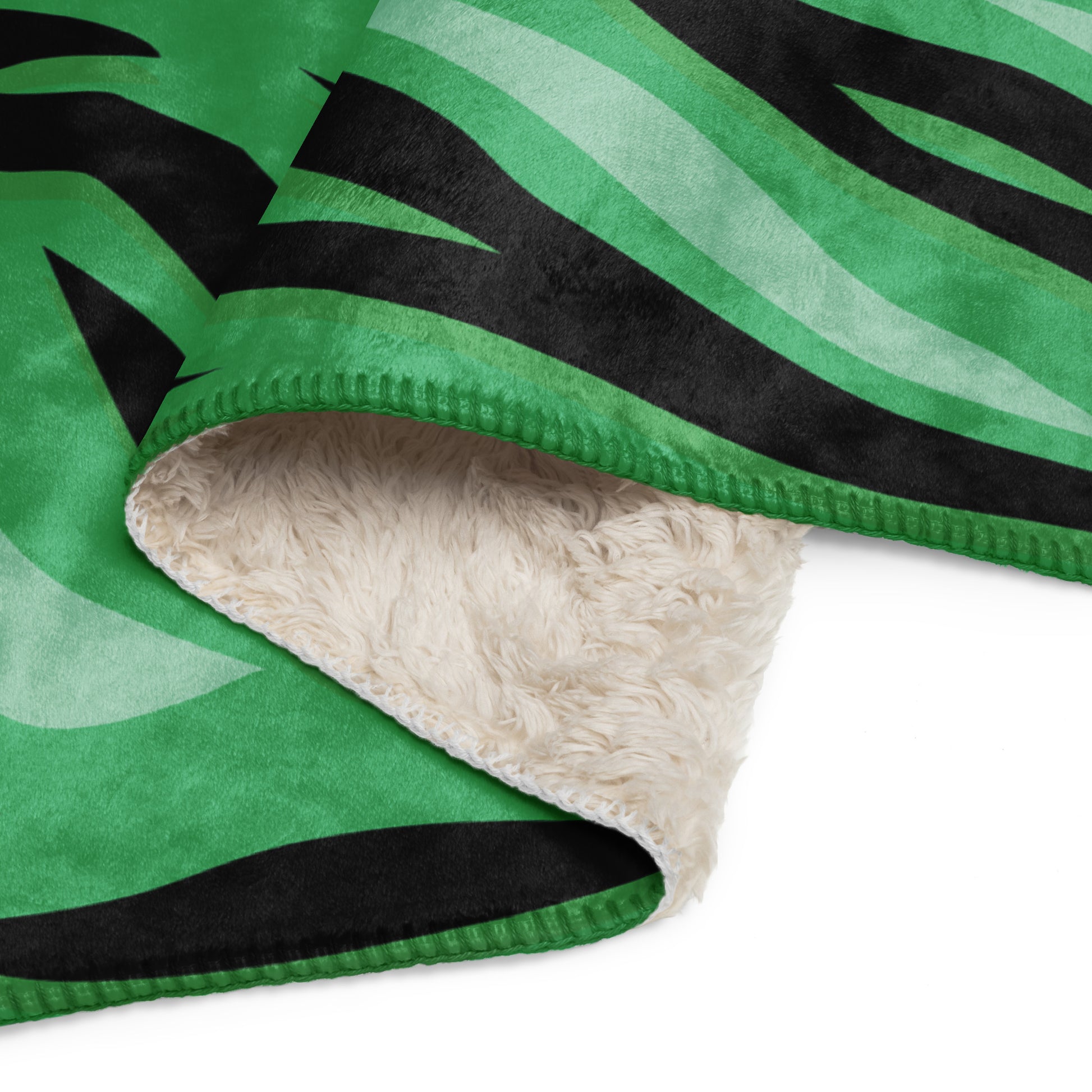 Green tiger blanket with green and black zebra stripes fleece and plush cream sherpa lining for cozy warmth