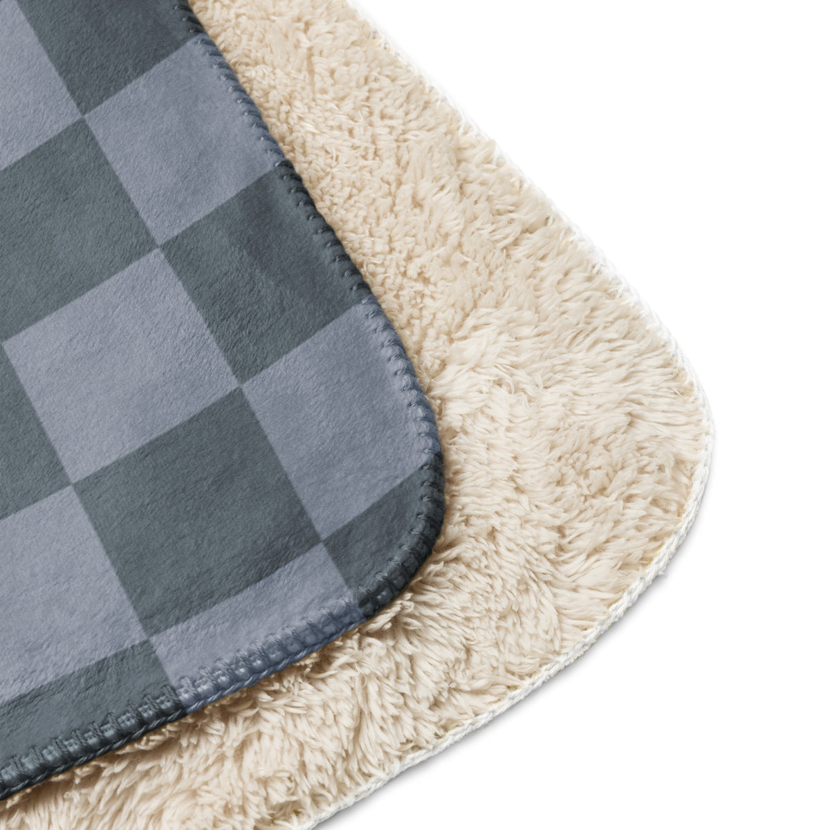 Gray checkered blanket featuring soft fleece material with plush cream sherpa lining for cozy warmth and comfort