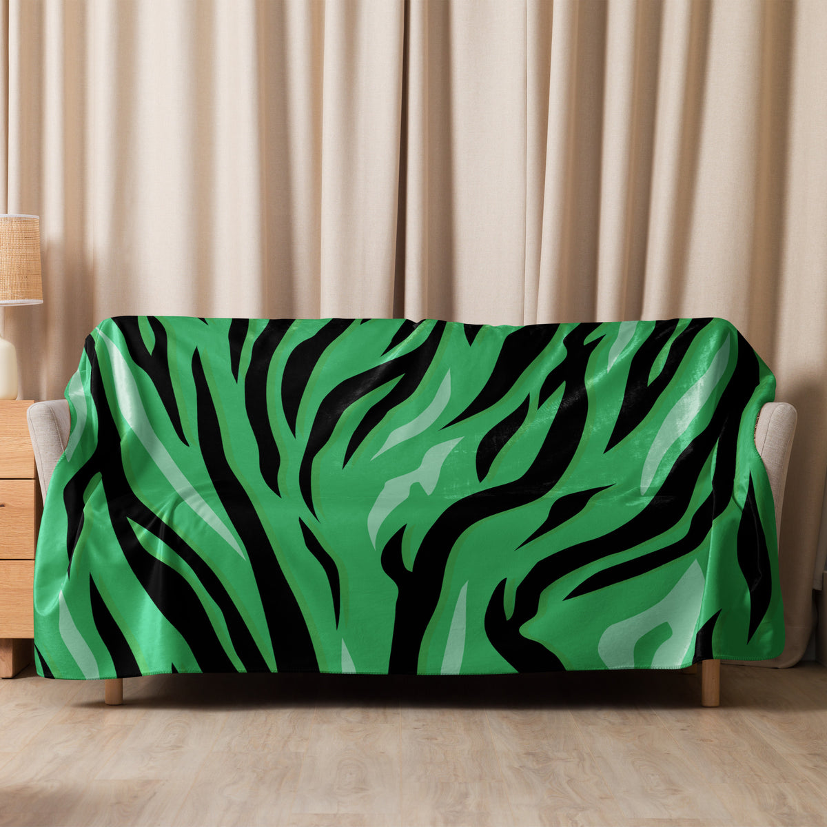 Green tiger blanket vibrant green and black zebra-striped soft throw draped over a sofa for cozy use