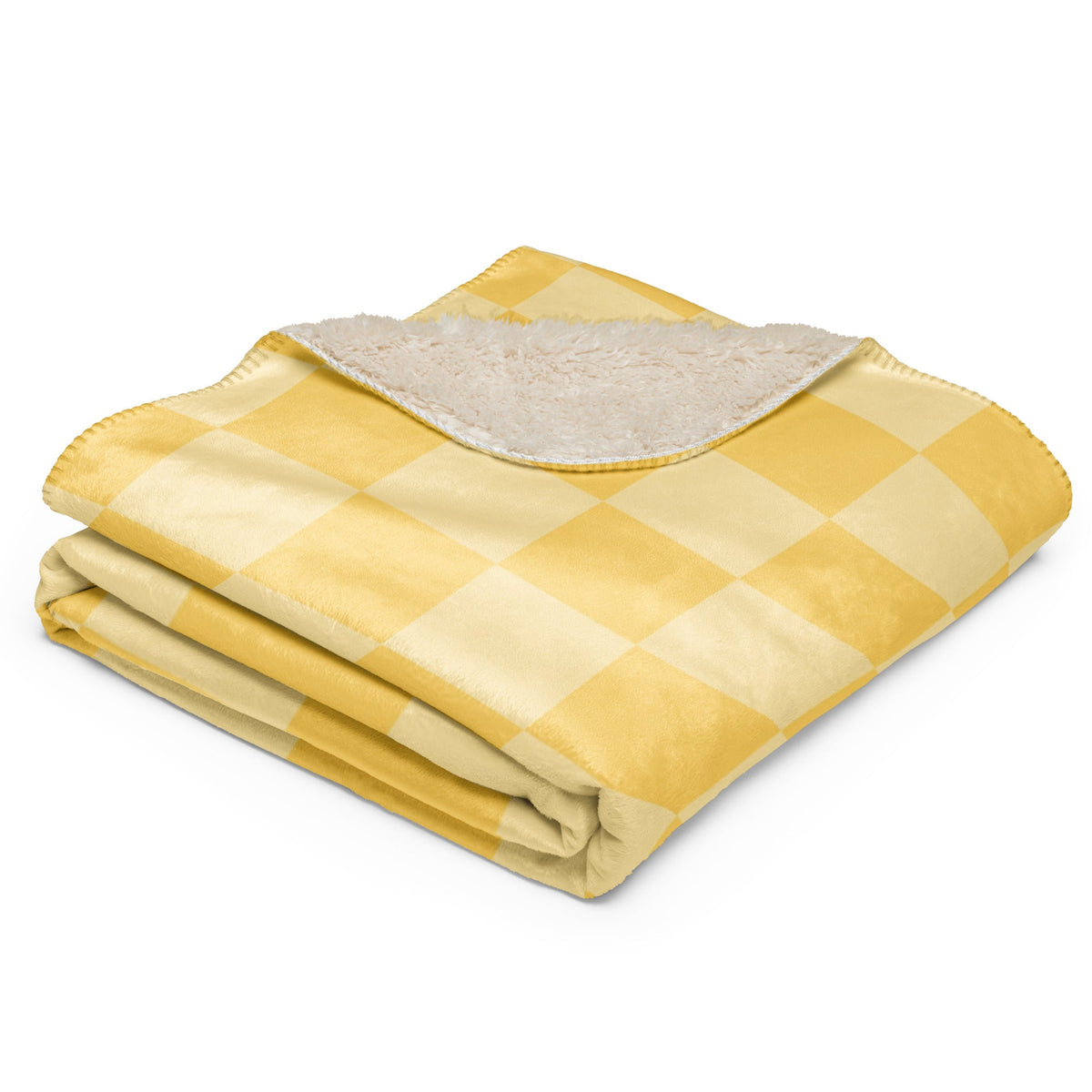 Yellow checkered blanket folded to show soft plush interior lining in yellow and cream colors