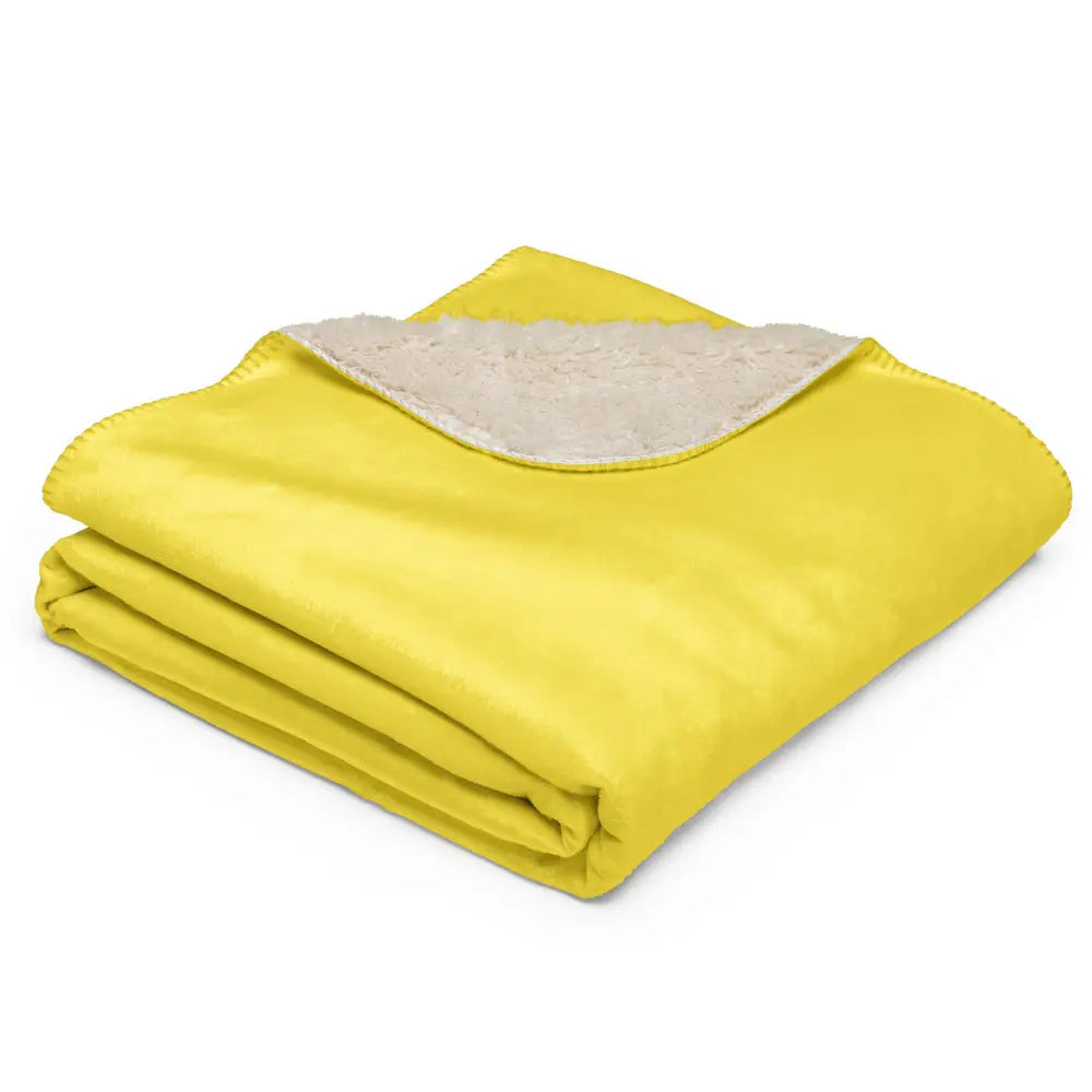 Bright yellow sherpa throw blanket with soft cream fleece lining perfect for cozy warmth and comfort
